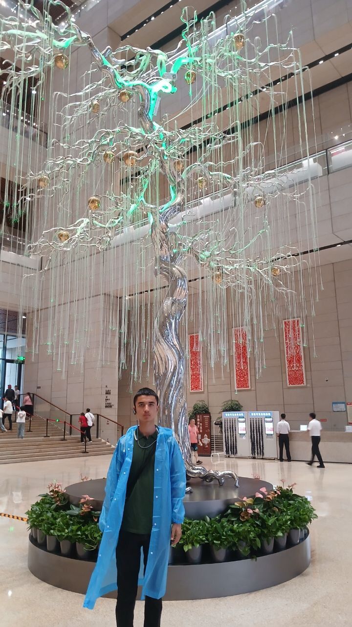 Asliddin in a museum hall in China